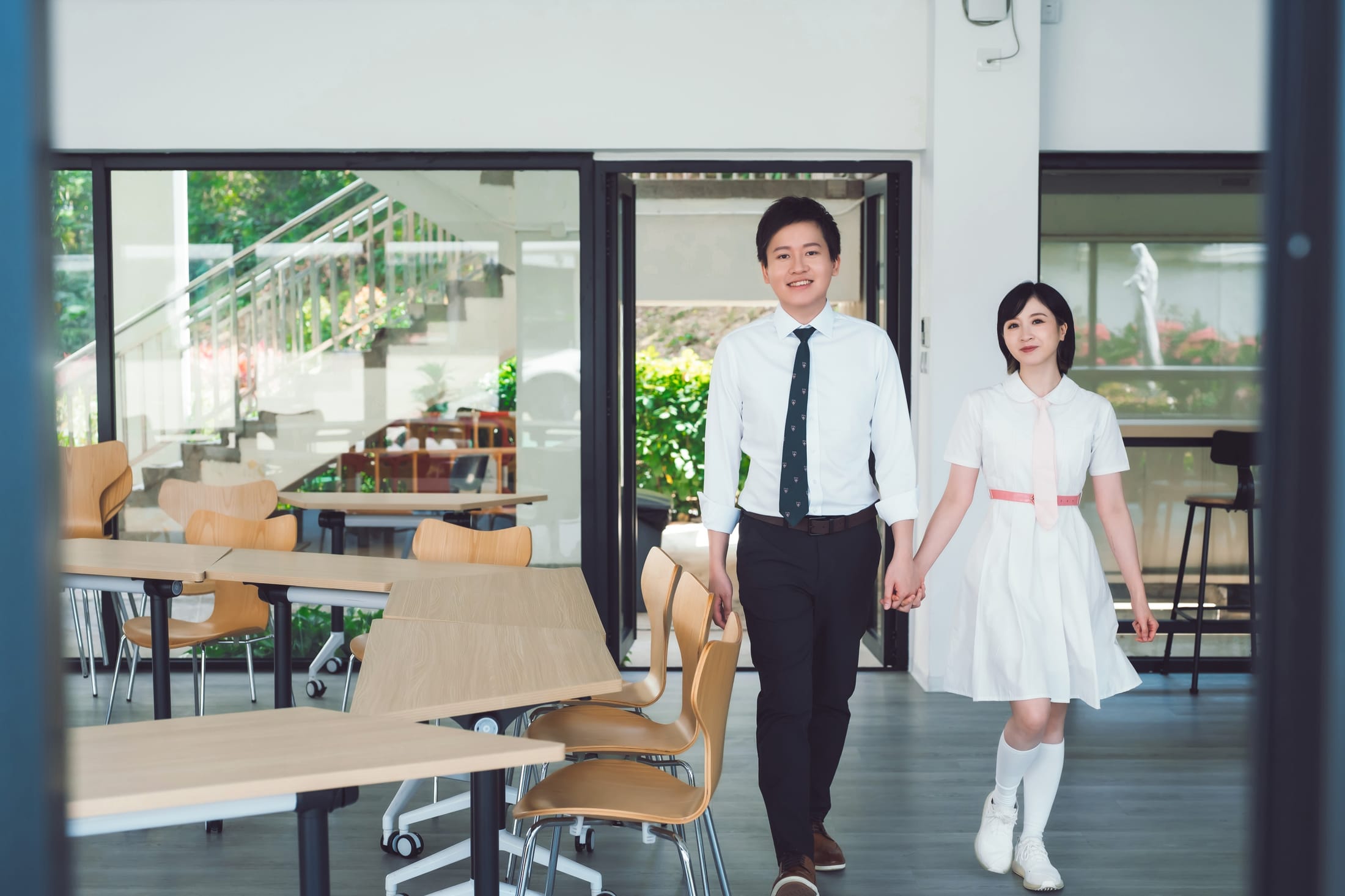 Flora and Hanny back in the classroom where they first met.